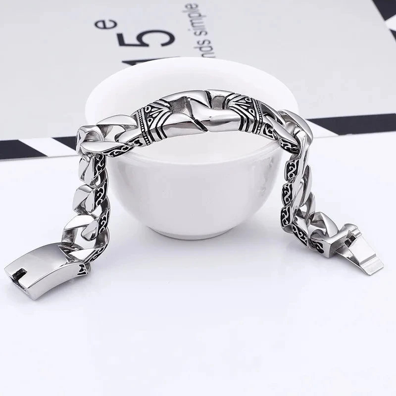 Men's titanium steel bracelets with personalized retro punk style patterns and portrait castings ,featuring decorative borders.