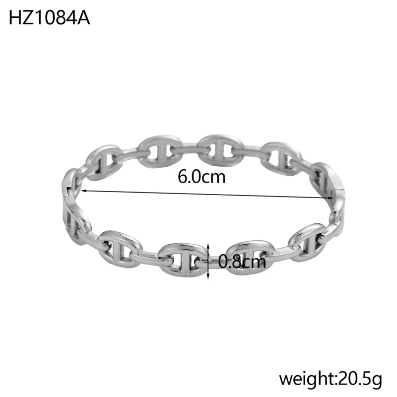 Titanium - Steel Gold - Plated C - Shaped Open - Ended Bangle. A Unique, Irregularly Spliced And Niche Accessory For Women.