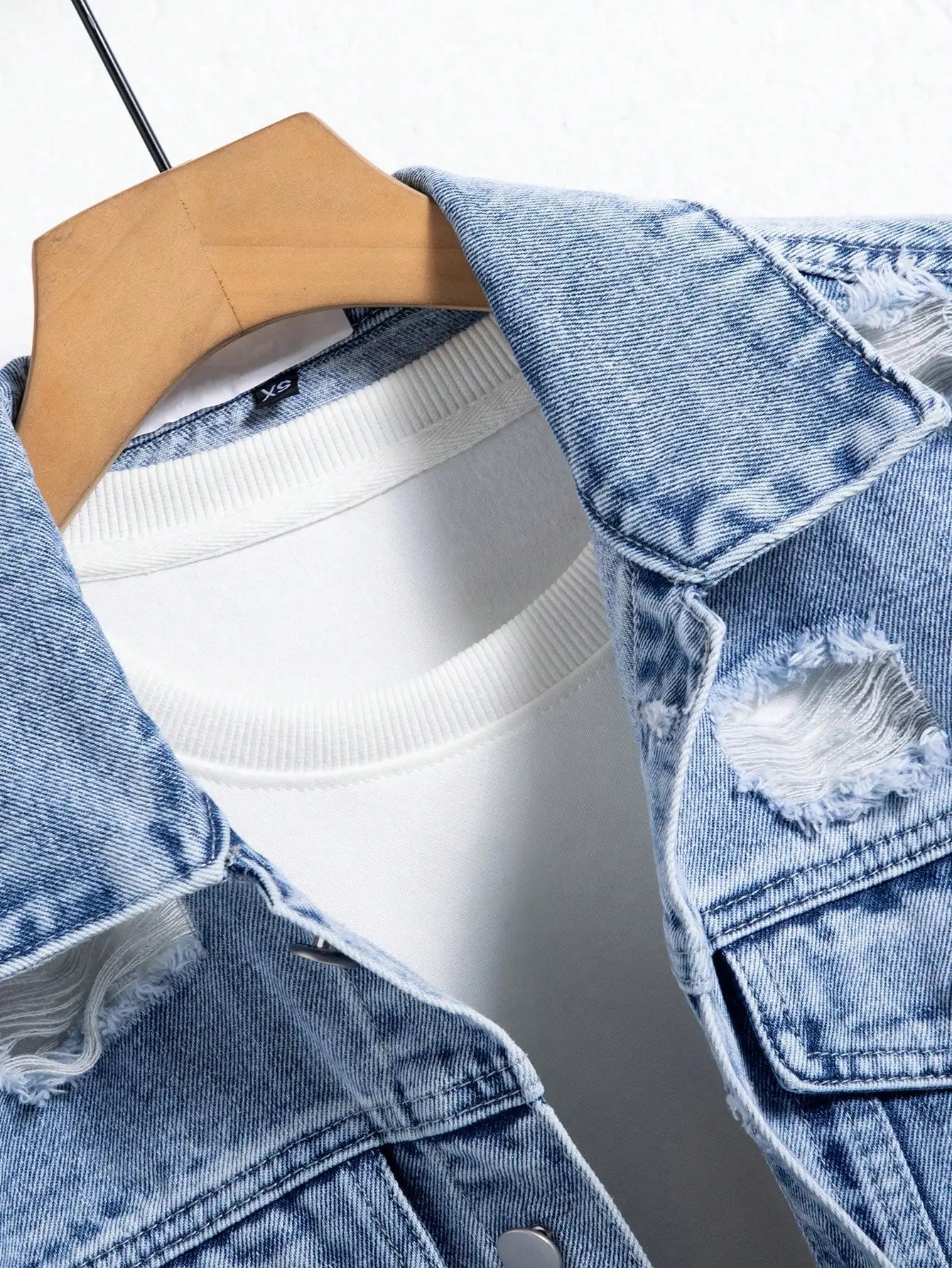 Men's denim jacket for spring and autumn. Blue ripped coat. Street fashion. Vintage - worn style. Daily casual.