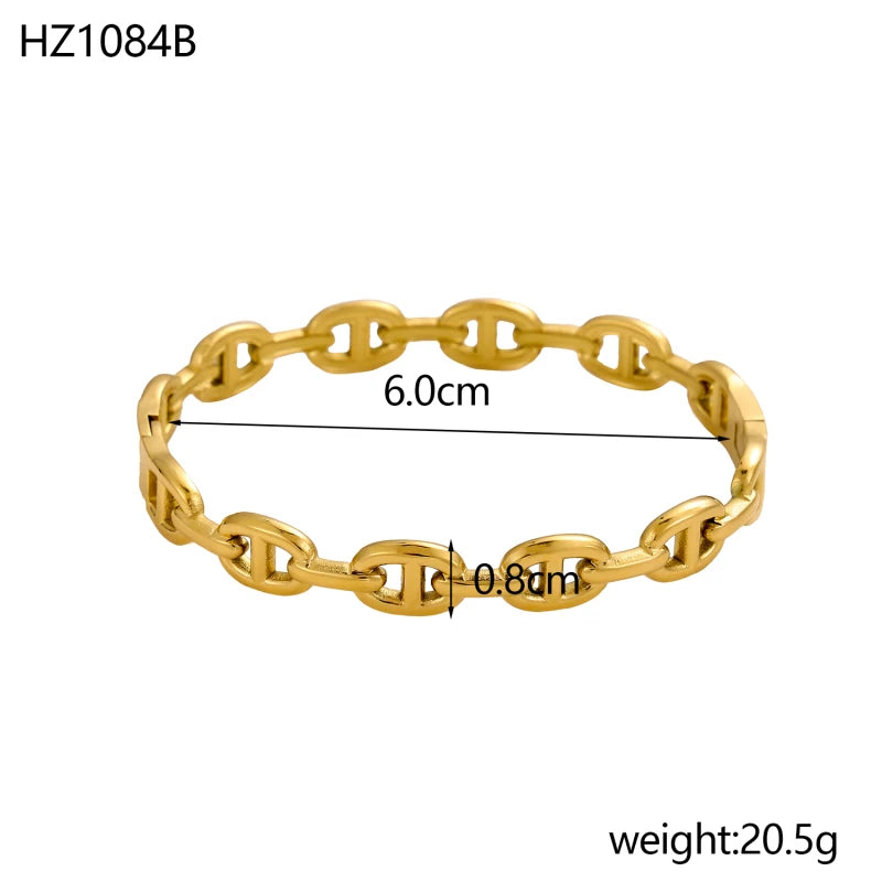 Titanium - Steel Gold - Plated C - Shaped Open - Ended Bangle. A Unique, Irregularly Spliced And Niche Accessory For Women.