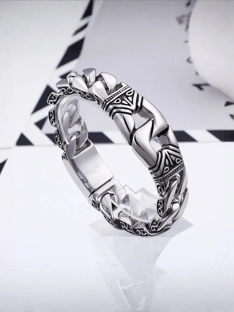 Men's titanium steel bracelets with personalized retro punk style patterns and portrait castings ,featuring decorative borders.