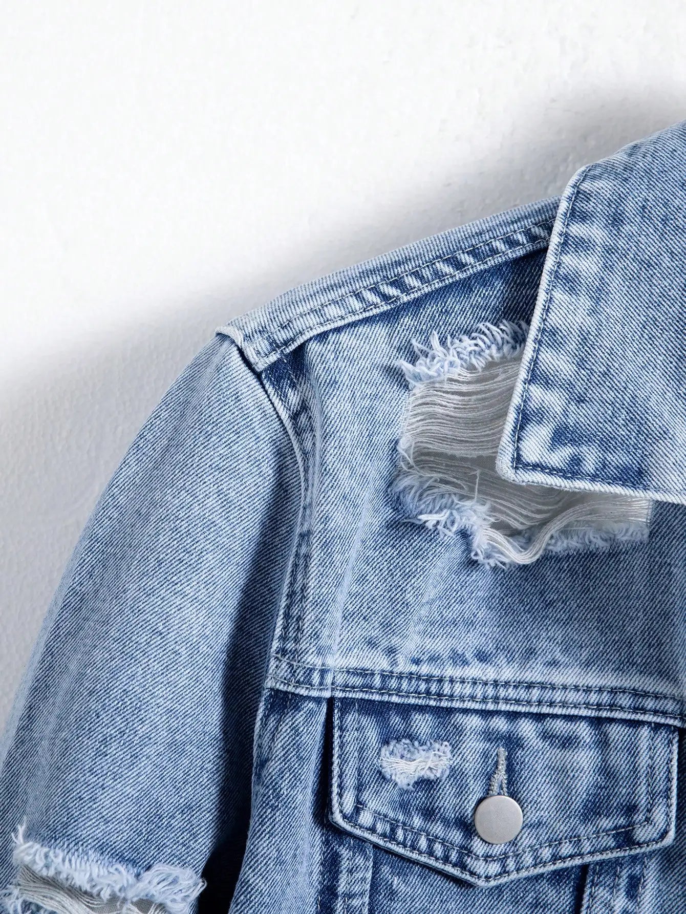 Men's denim jacket for spring and autumn. Blue ripped coat. Street fashion. Vintage - worn style. Daily casual.