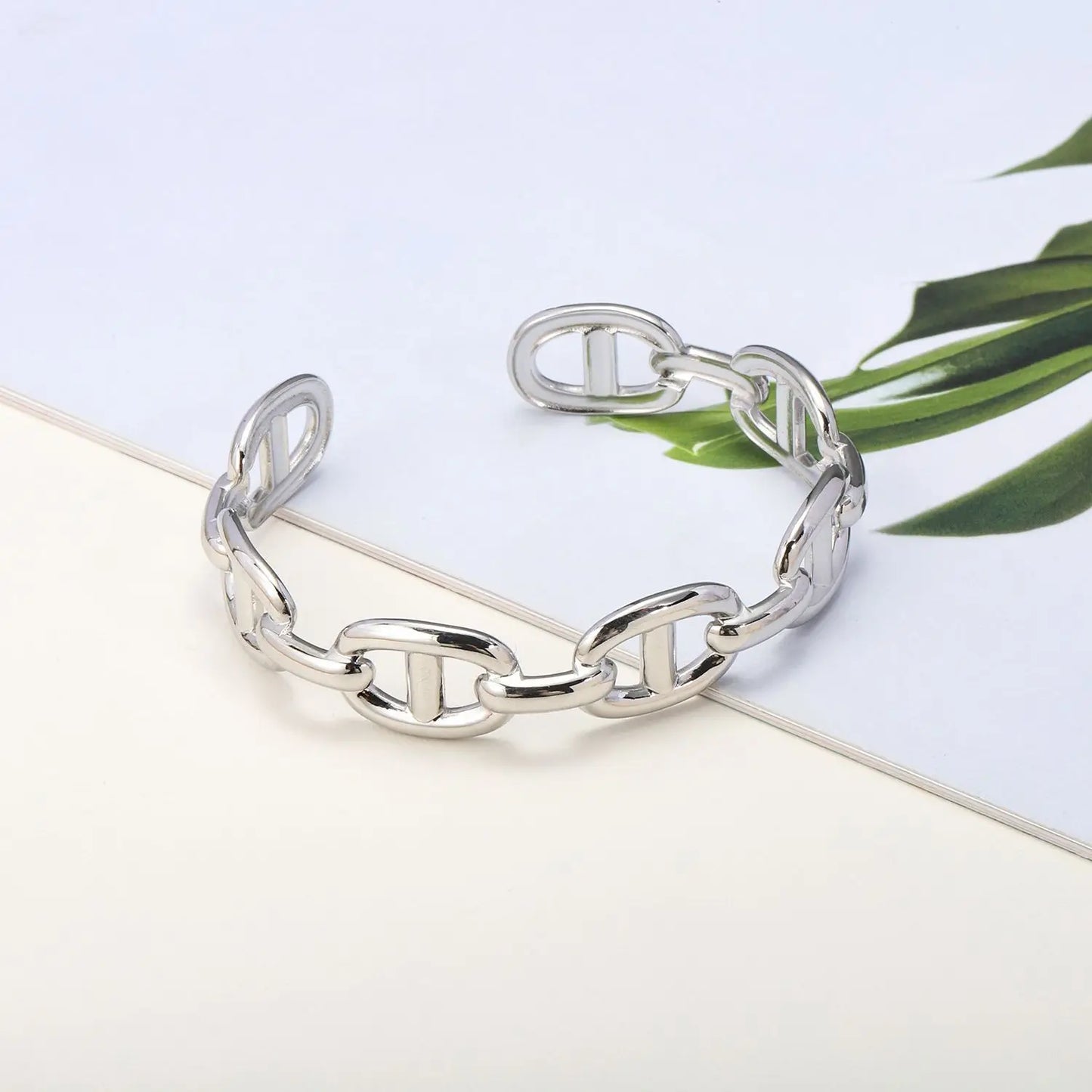 Titanium - Steel Gold - Plated C - Shaped Open - Ended Bangle. A Unique, Irregularly Spliced And Niche Accessory For Women.