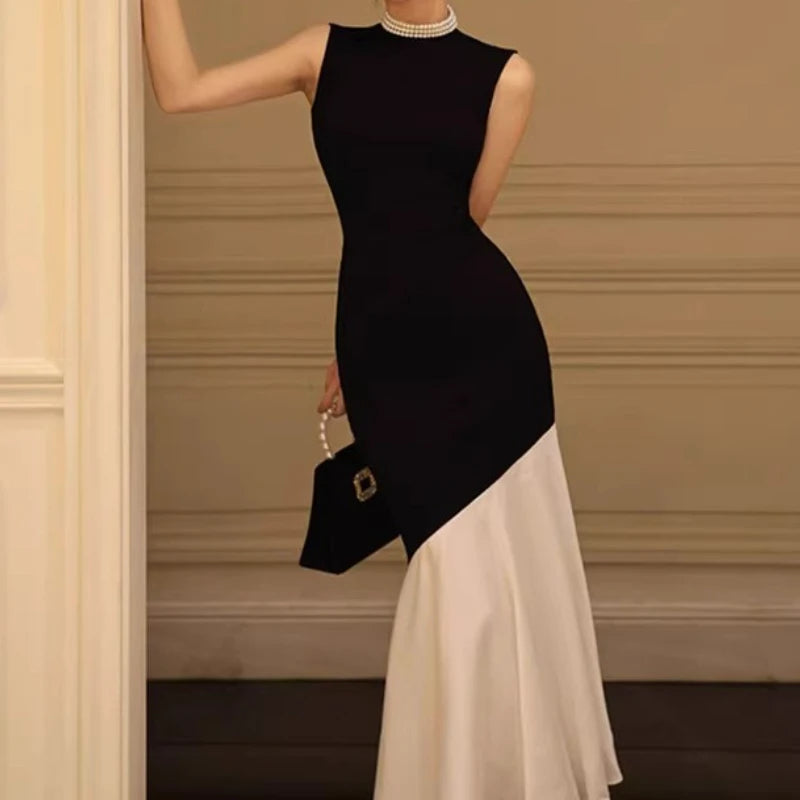 New French-style black dress for women, sleeveless, fitted with stitch detailing, elegant fishtail knitted long dress