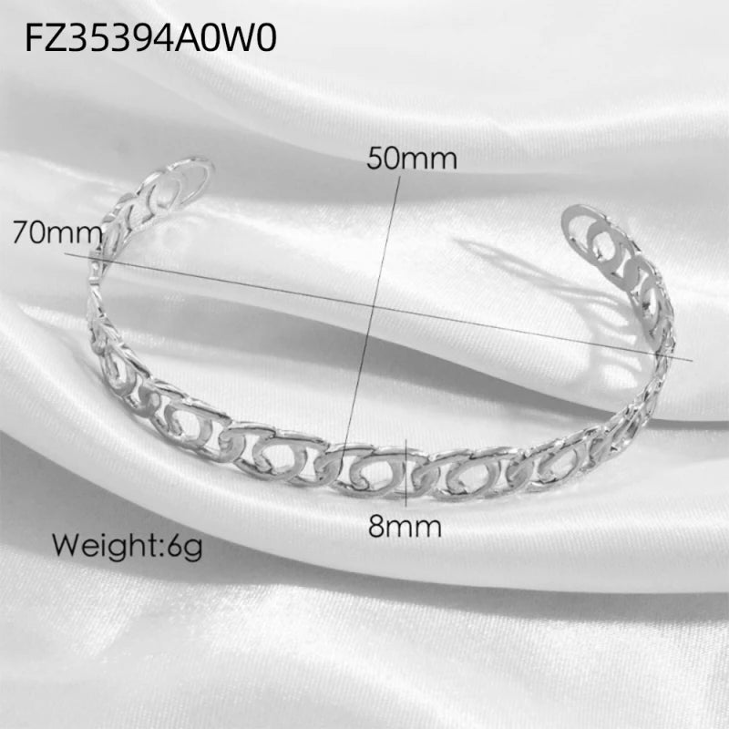 Titanium - Steel Gold - Plated C - Shaped Open - Ended Bangle. A Unique, Irregularly Spliced And Niche Accessory For Women.