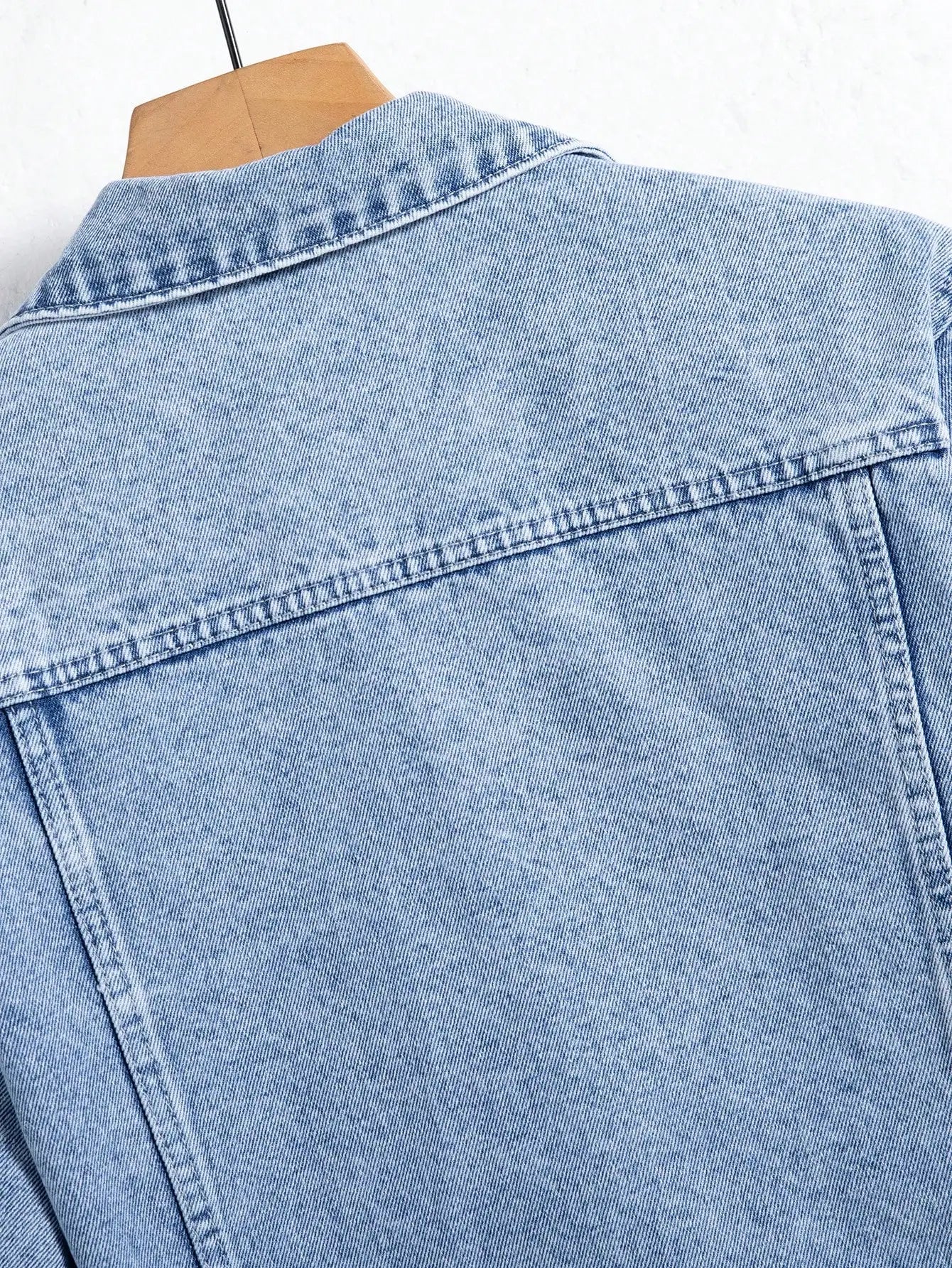 Men's denim jacket for spring and autumn. Blue ripped coat. Street fashion. Vintage - worn style. Daily casual.