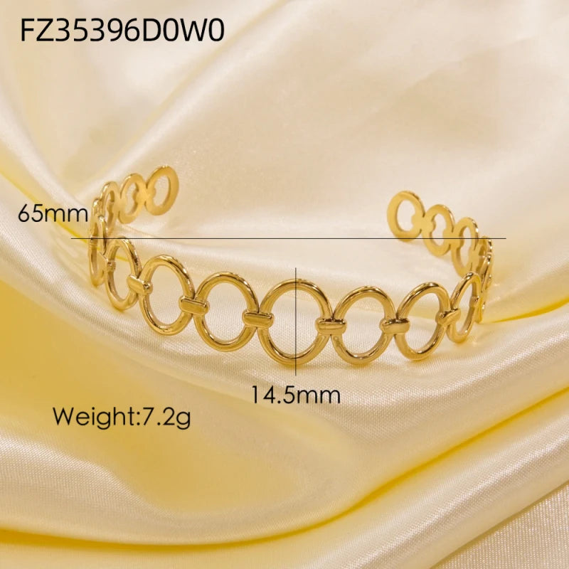 Titanium - Steel Gold - Plated C - Shaped Open - Ended Bangle. A Unique, Irregularly Spliced And Niche Accessory For Women.